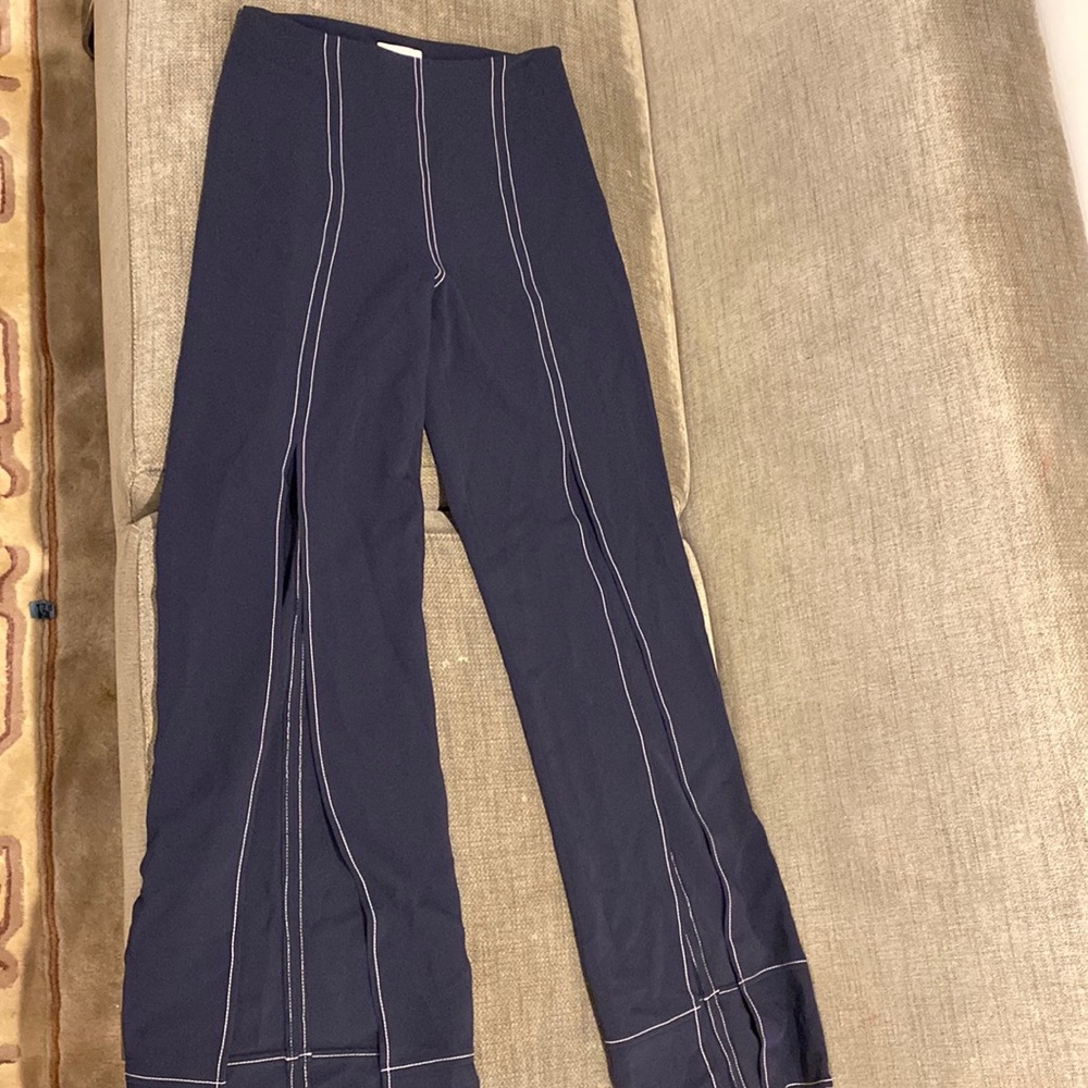Many white stitch high rise wide leg pant with slit